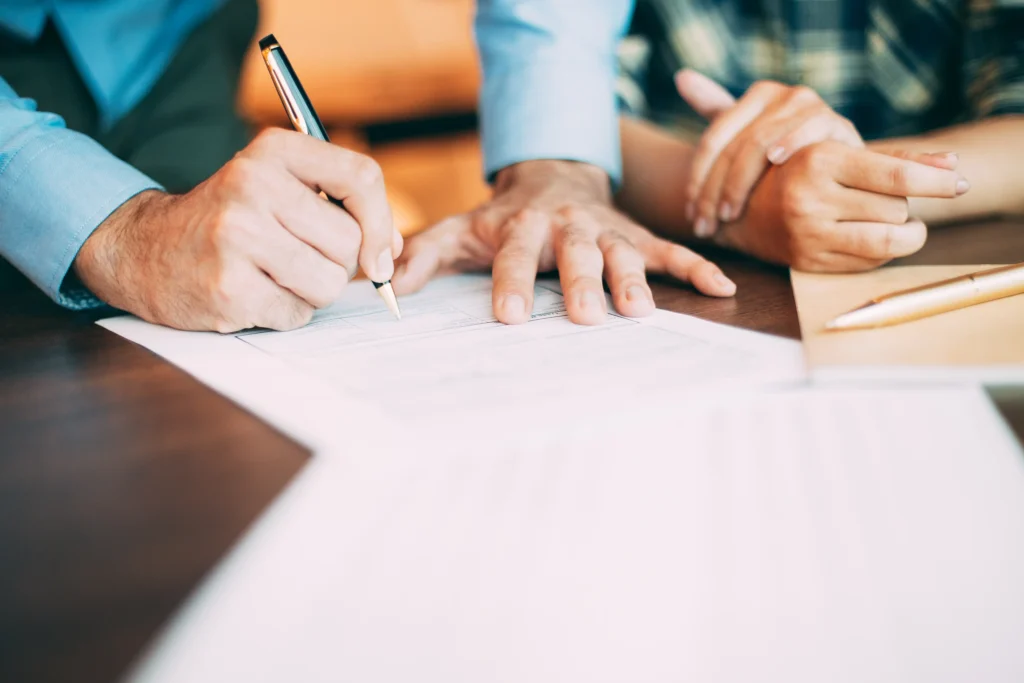 A modern family discussing future plans with a professional offering Will Writing Service Wiltshire
